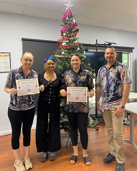 L-R Keyworker – Jess, Vice Chair - Kay Gehan, Children’s worker - Chloe, Chairperson - Darren Johnson with their CORE awards in front of Christmas tree